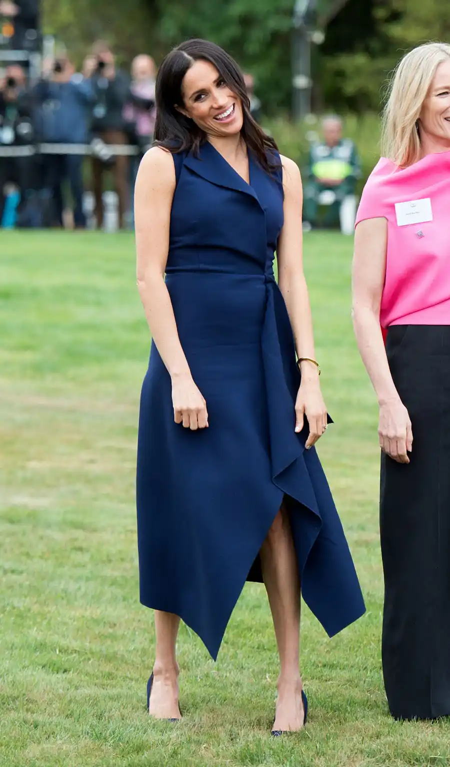 Pregnant Meghan Markle Plays Football