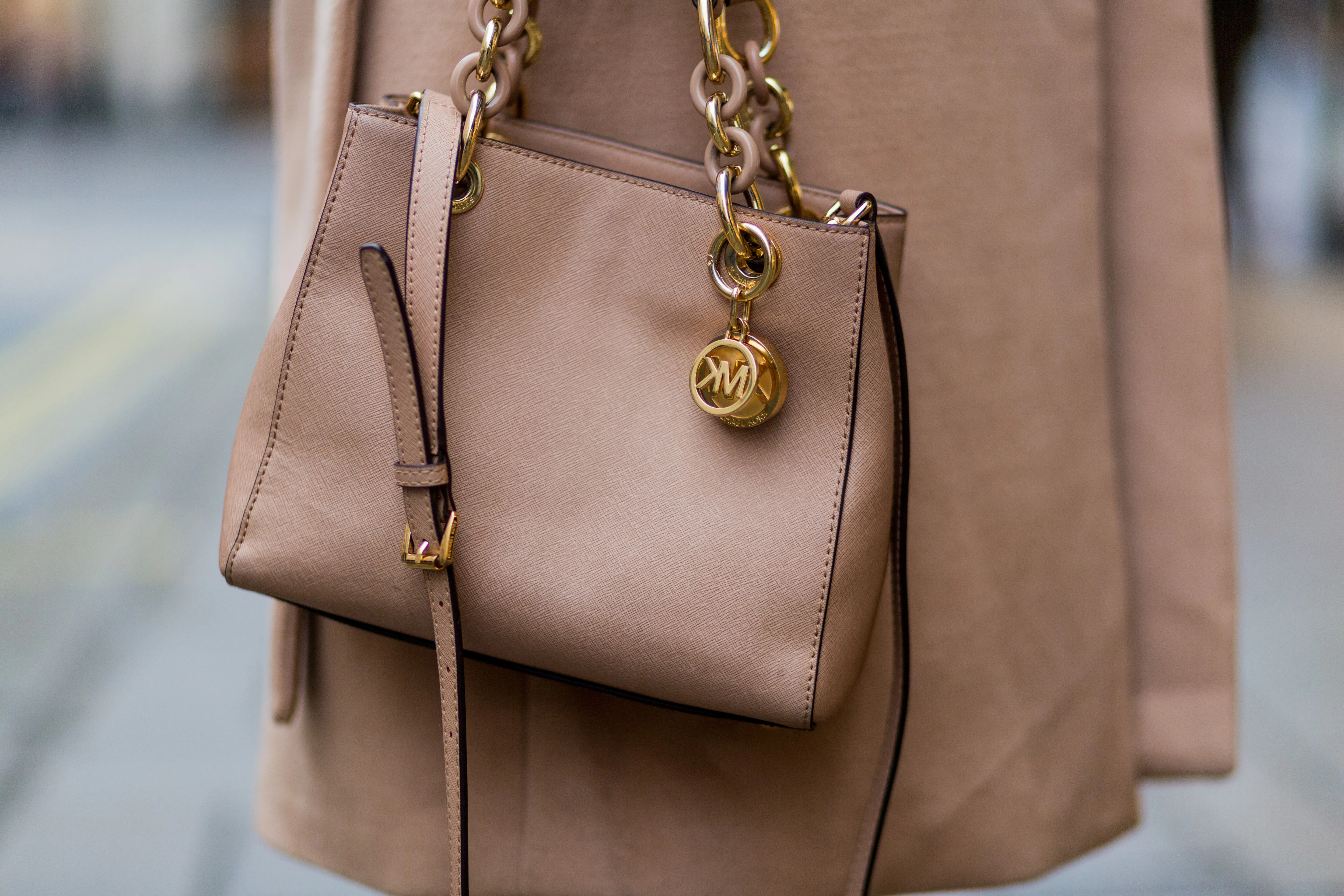 woman with michael kors bag