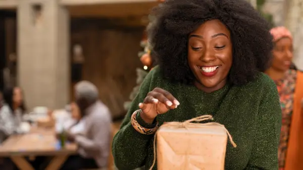 woman opening gifts