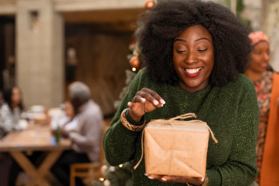 woman opening gifts