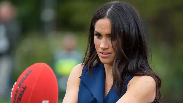 Pregnant Meghan Markle Plays Football