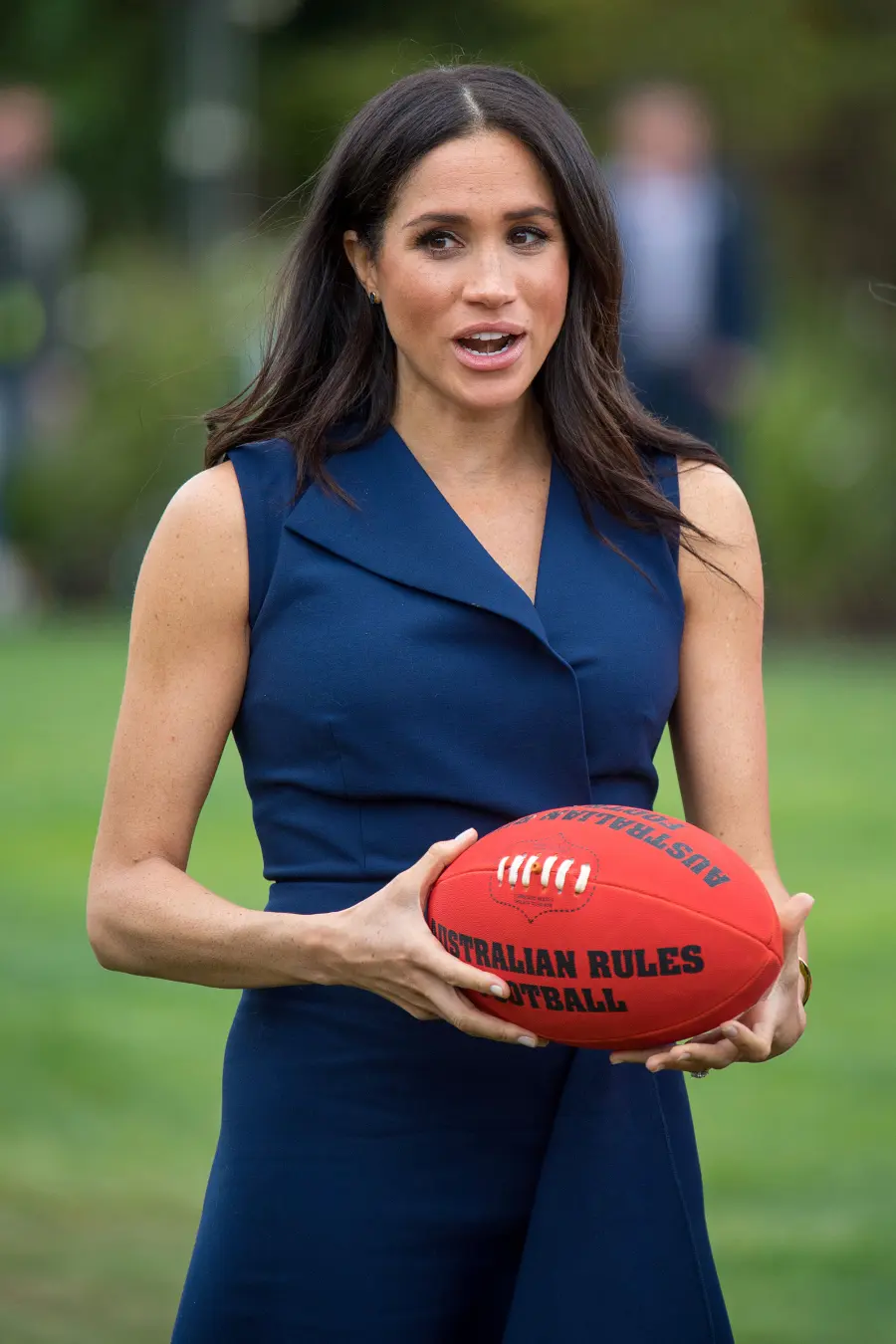Pregnant Meghan Markle Plays Football