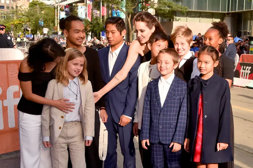 Loung Ung, Vivienne Jolie-Pitt, Maddox Jolie-Pitt, Pax Jolie-Pitt, Angelina Jolie, Kimhak Mun, Knox Jolie-Pitt, Shiloh Jolie-Pitt, Zahara Jolie-Pitt and Sareum Srey Moch.