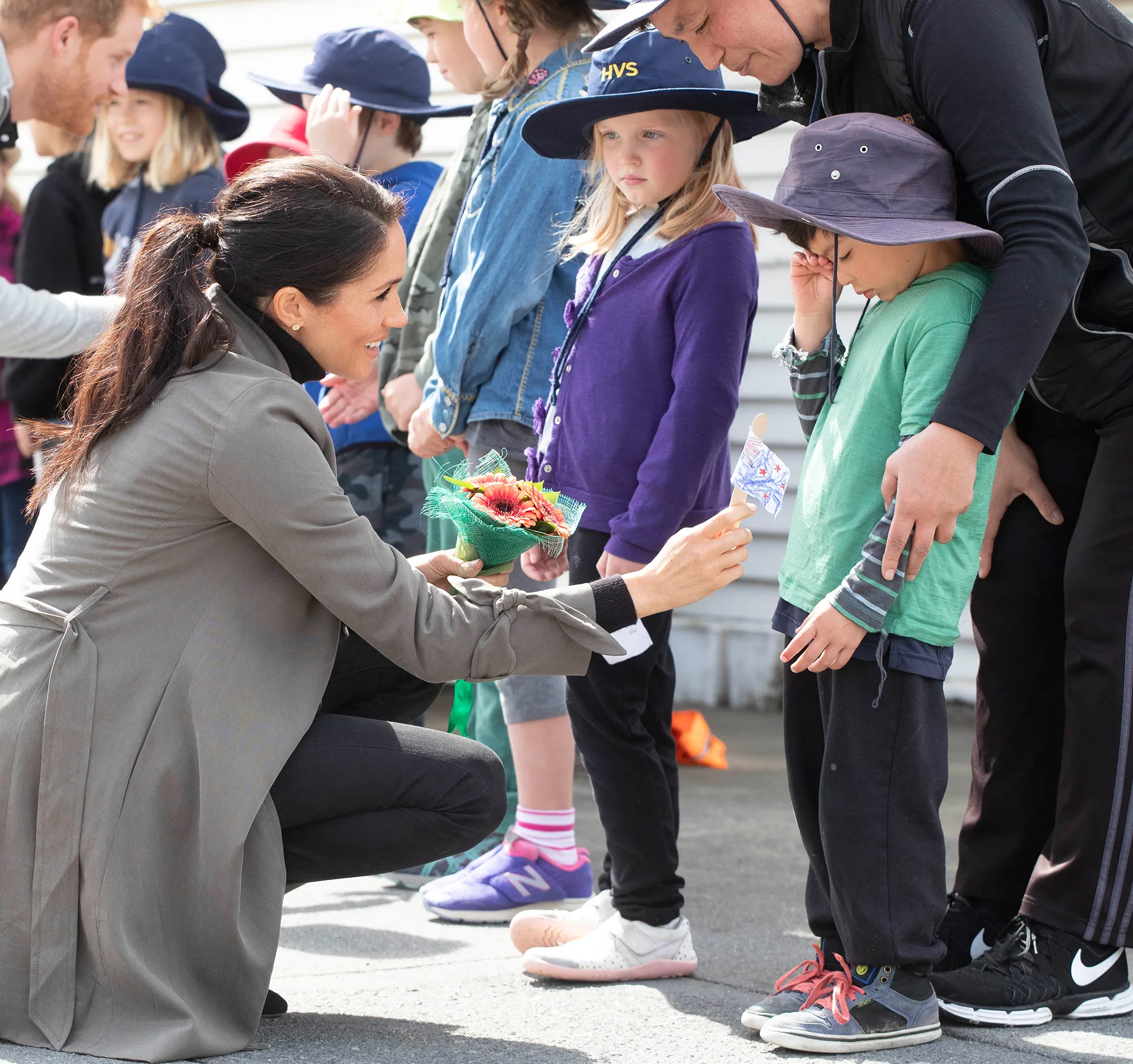 Meghan, Duchess of Sussex meets children