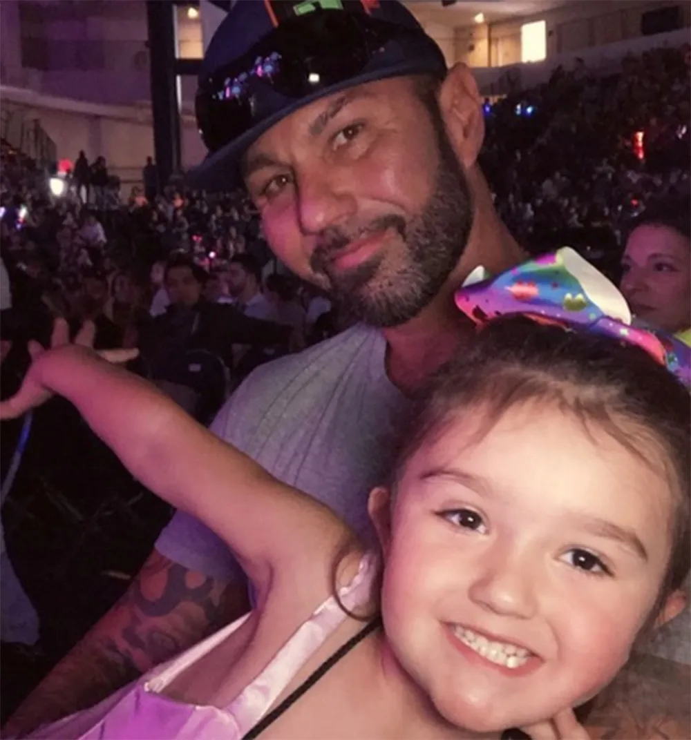 Roger Mathews and daughter