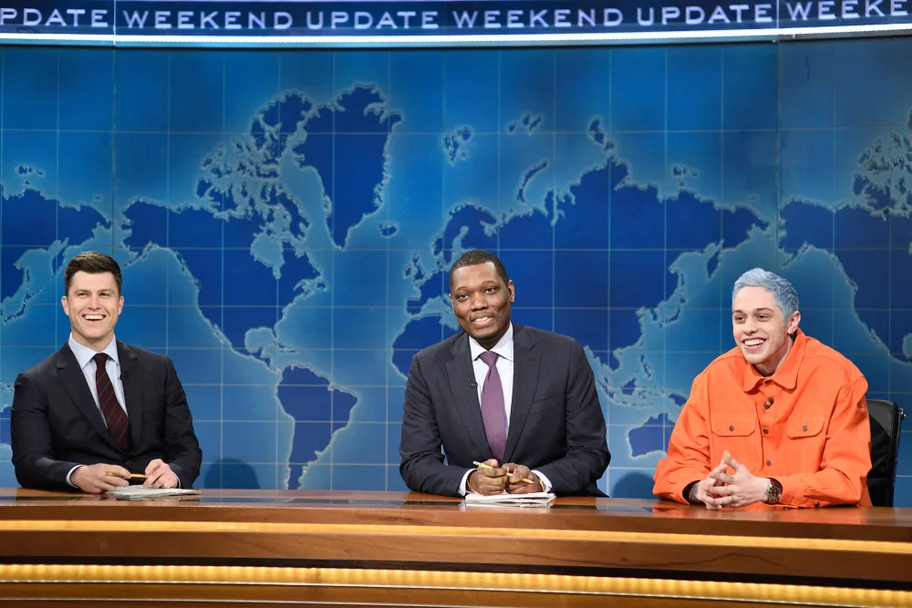 Colin Jost and Michael Che with Pete Davidson during "Weekend Update."
