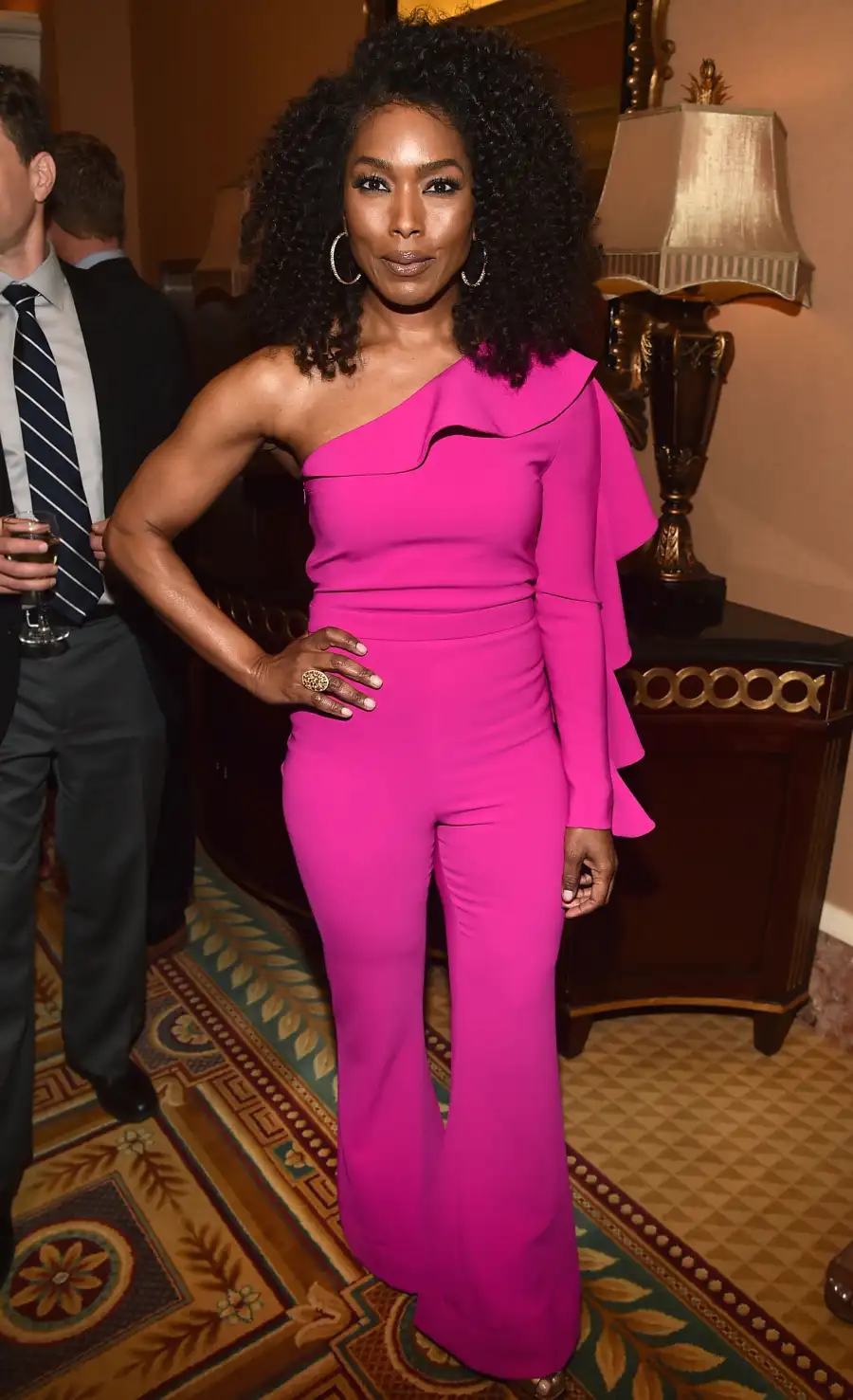 Angela-Bassett ruffled pink jumpsuit