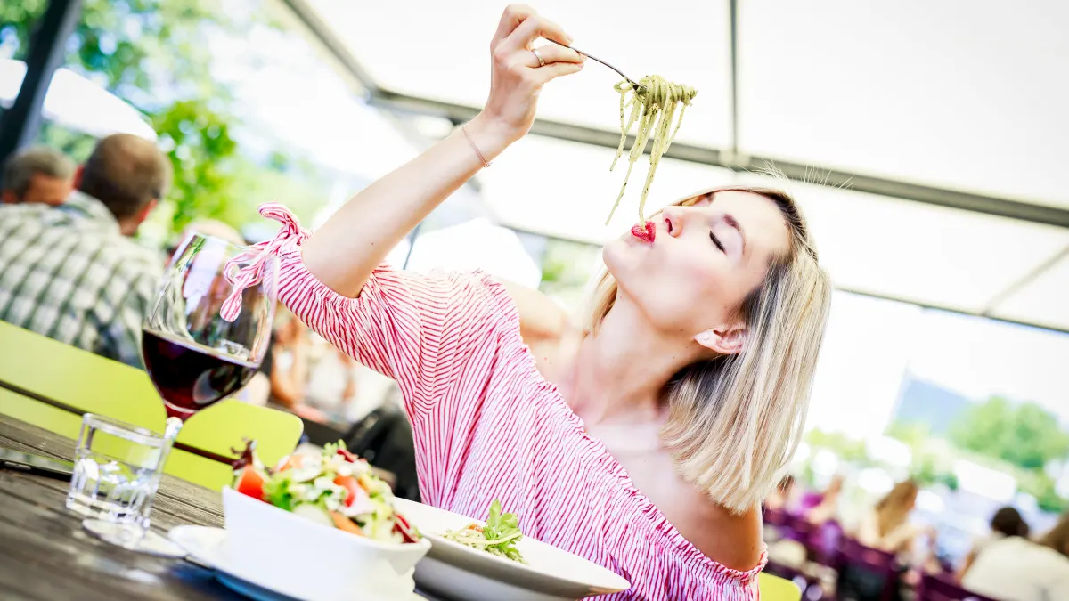 woman eating salad