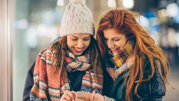 women with shopping bags