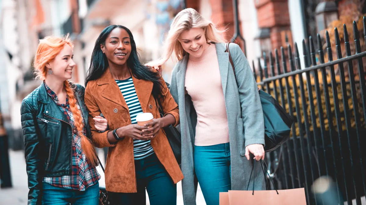 women carrying shopping bags