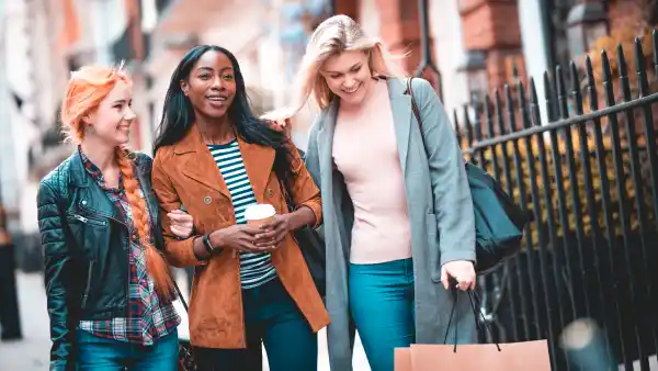 women carrying shopping bags