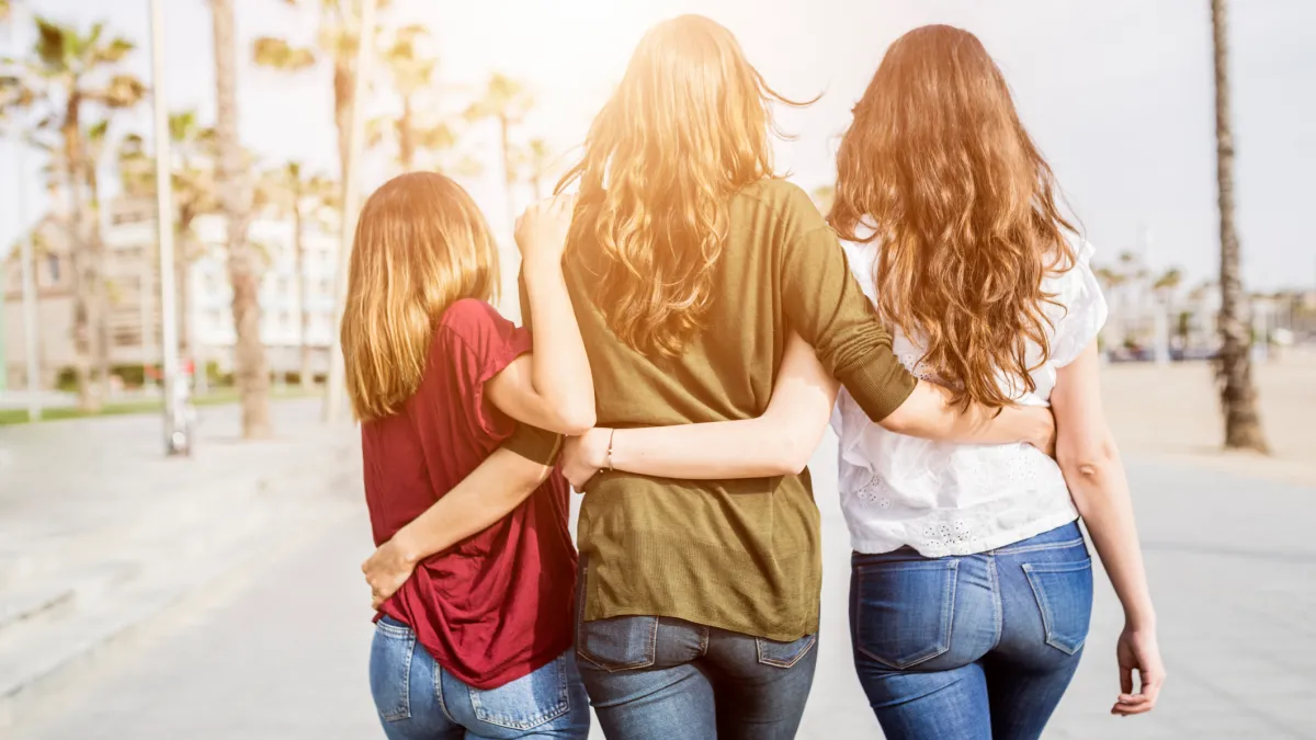 women wearing flattering jeans