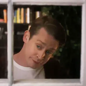 Macaulay Culkin Makes a Hilarious Parody of His 'Replica Luxury Handbag Alone' Character As an Adult