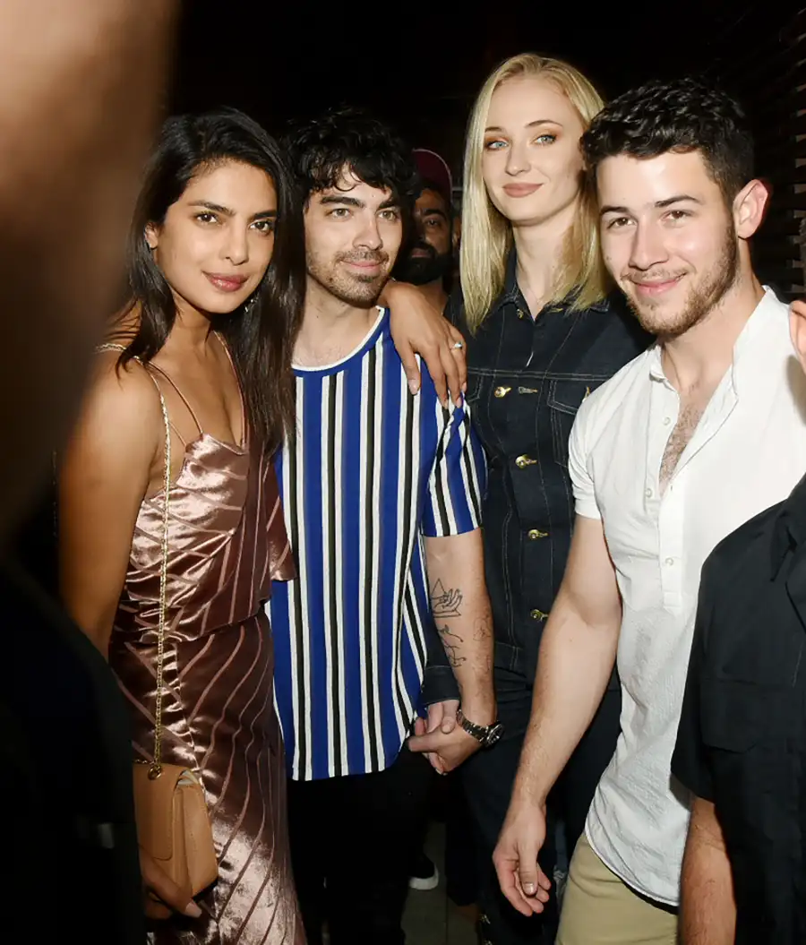 Bollywood actor Priyanka Chopra (L) with her fiancee Nick Jonas