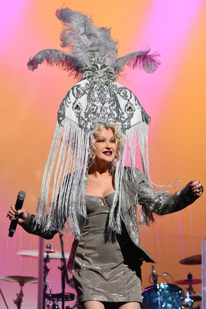 Cyndi Lauper performs onstage during Cyndi Lauper's 8th Annual 'Replica Luxury Handbag For The Holidays' Benefit Concert.