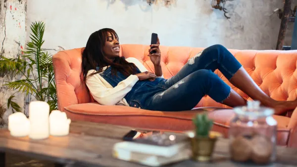 woman-on-couch-with-lit-candles