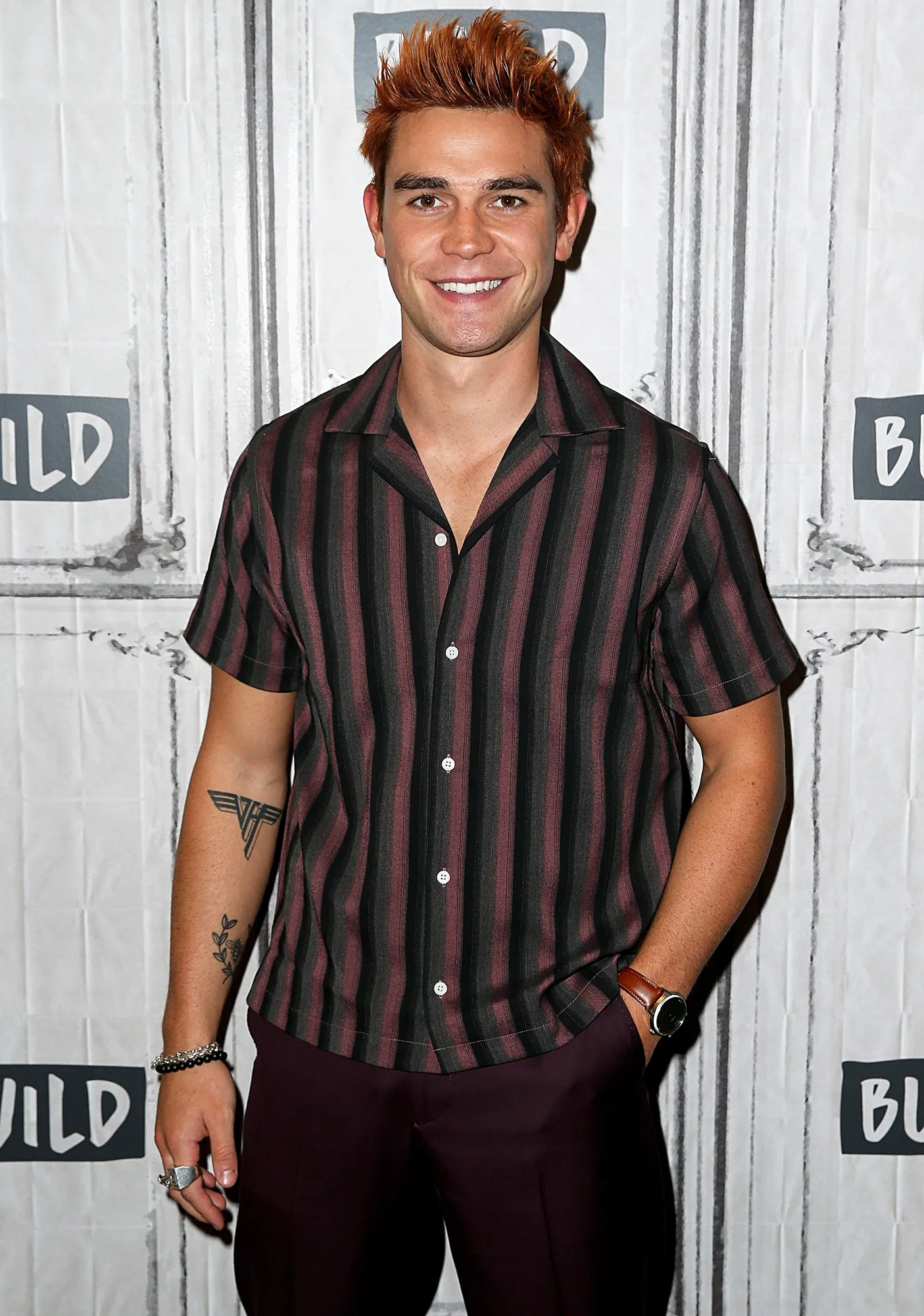 KJ Apa Cuddles Tiny Dog Shirtless