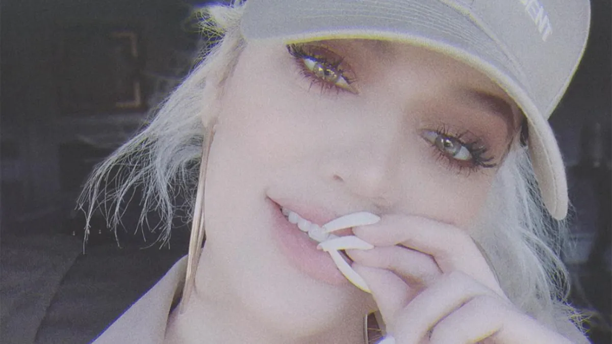 Khloe Kardashian in Kanye for President Baseball hat