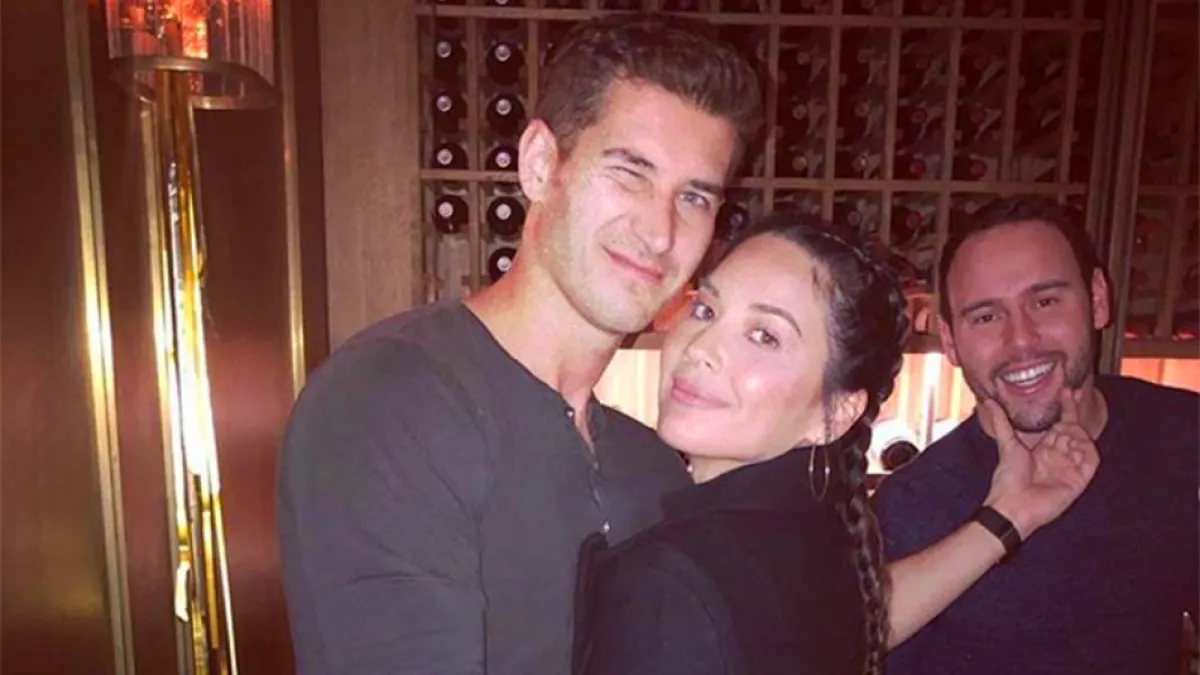 Olivia Munn and Tucker Roberts at Scooter Braun's New Year's Eve party.