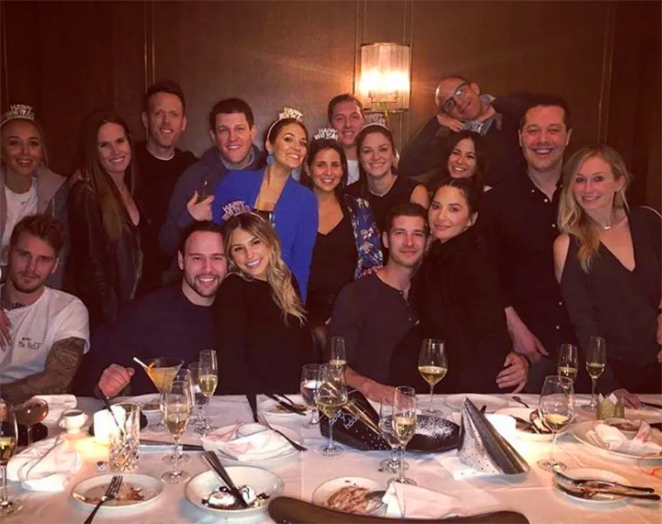 Olivia Munn and Tucker Roberts at Scooter Braun's New Year's Eve party.