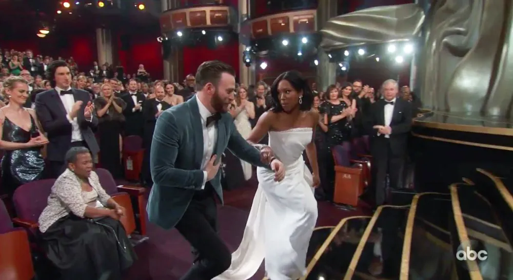 Chris Evans Escorting Regina King to the Stage Oscars 2019