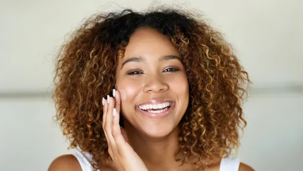 woman applying face cream