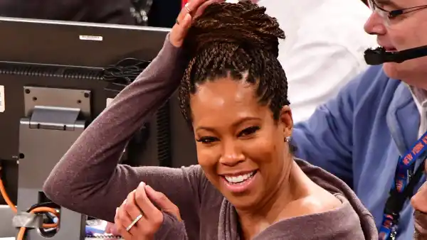 Regina King Is Nearly Taken Out by 76ers Player Joel Embiid at Basketball Game