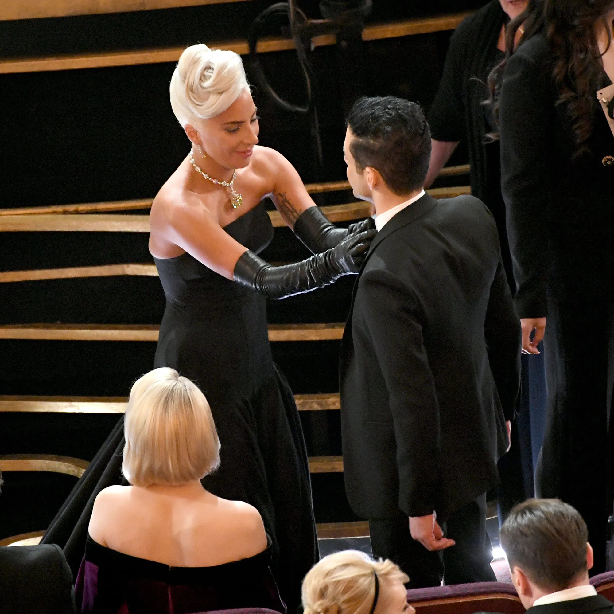 oscars 2019 Lady Gaga Fixes Fellow Nominee Rami Malek’s Tie at Oscars 2019