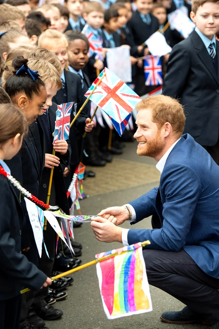 Prince Harry Bonds With Children, Plays With Winnie the Dog During Visit to St. Vincent’s Catholic Primary School
