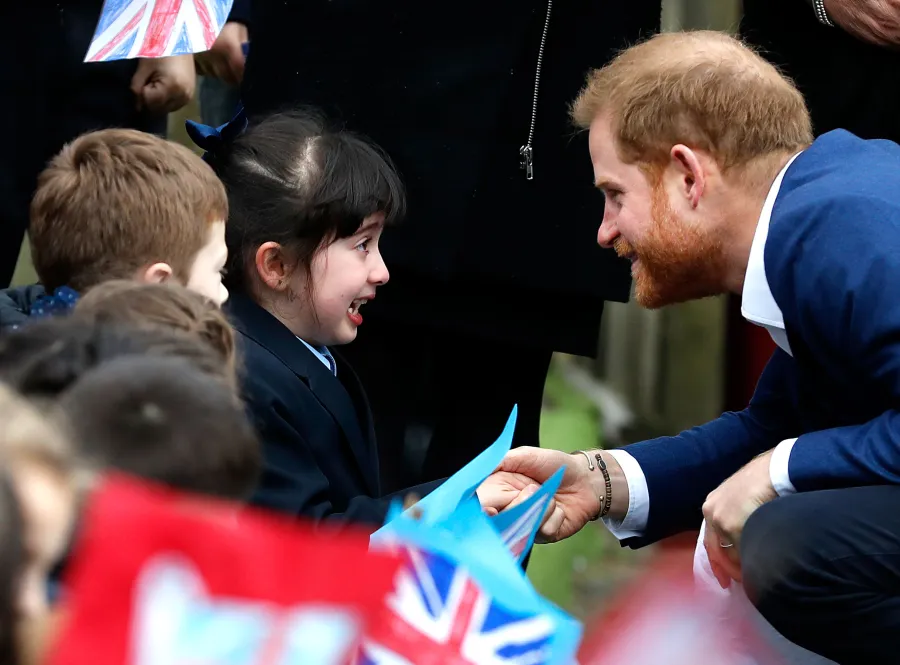 Prince Harry Bonds With Children, Plays With Winnie the Dog During Visit to St. Vincent’s Catholic Primary School