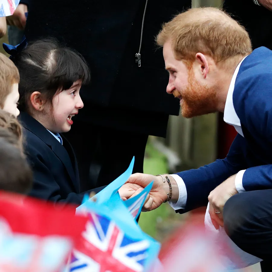 Prince Harry Bonds With Children, Plays With Winnie the Dog During Visit to St. Vincent’s Catholic Primary School