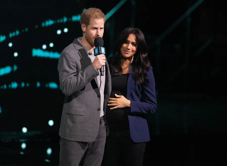 Prince Harry Surprises Crowd and Drags Pregnant Wife Duchess Meghan on Stage at Charity Event