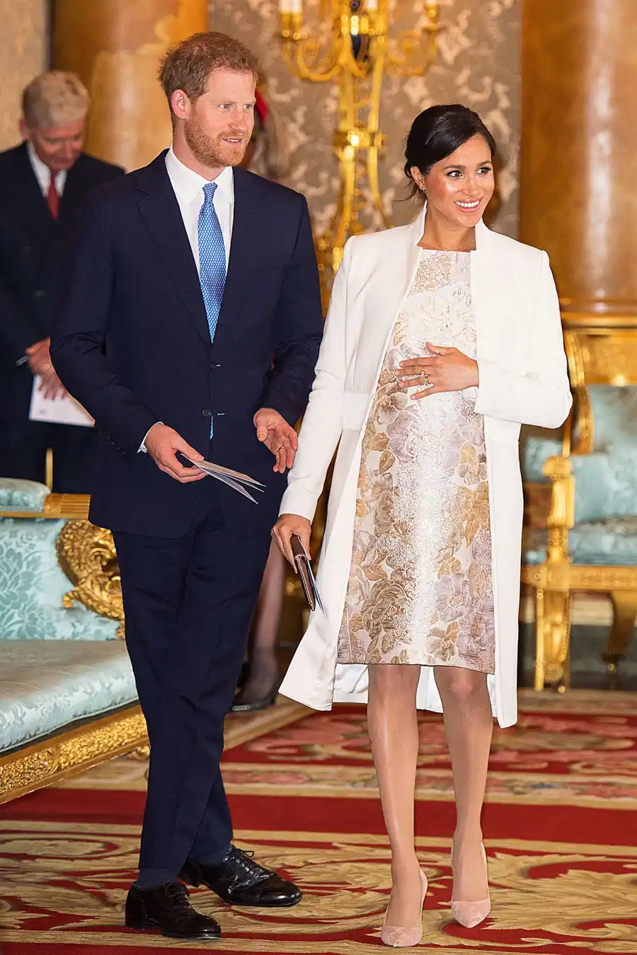 Britain's Prince Harry, Duke of Sussex, (L) and Britain's Meghan, Duchess of Sussex (R)