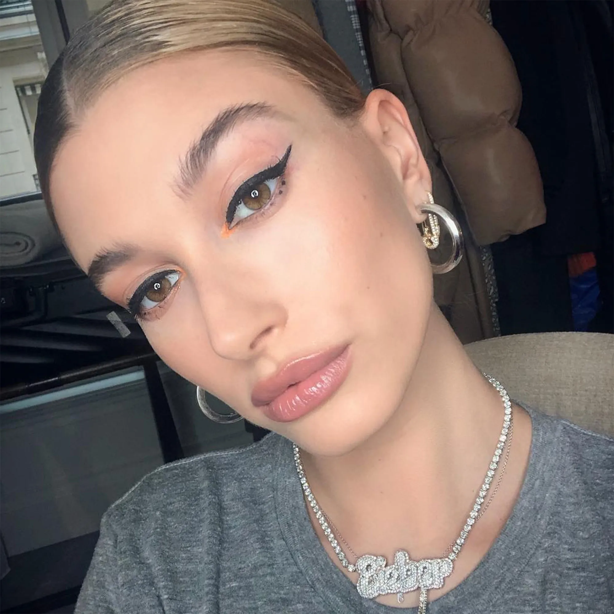 Hailey Baldwin Rocks a Bieber Nameplate at PFW