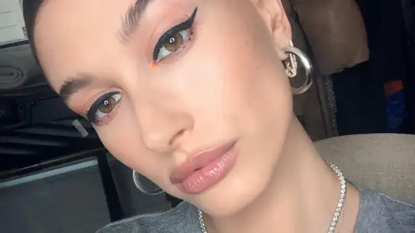 Hailey Baldwin Rocks a Bieber Nameplate at PFW