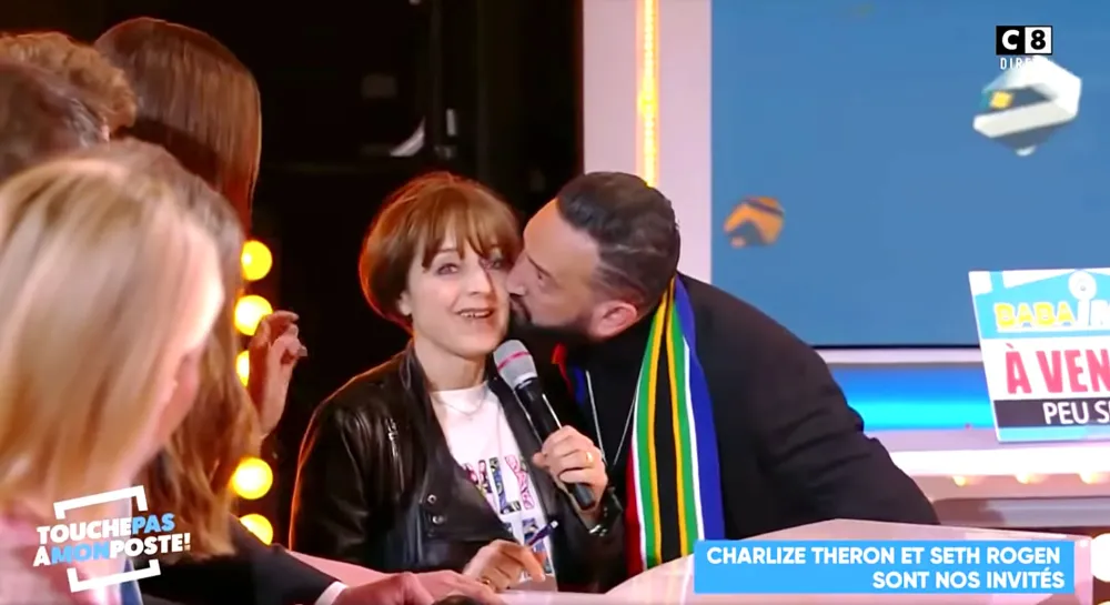 Charlize Theron Shuts Down Man Who Kissed Her Interpreter