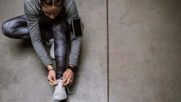Young athlete jogging in underground garage