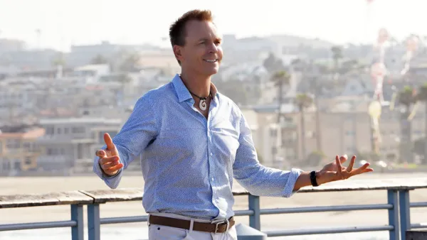 The Amazing Race Premiere Host Phil Keohgan