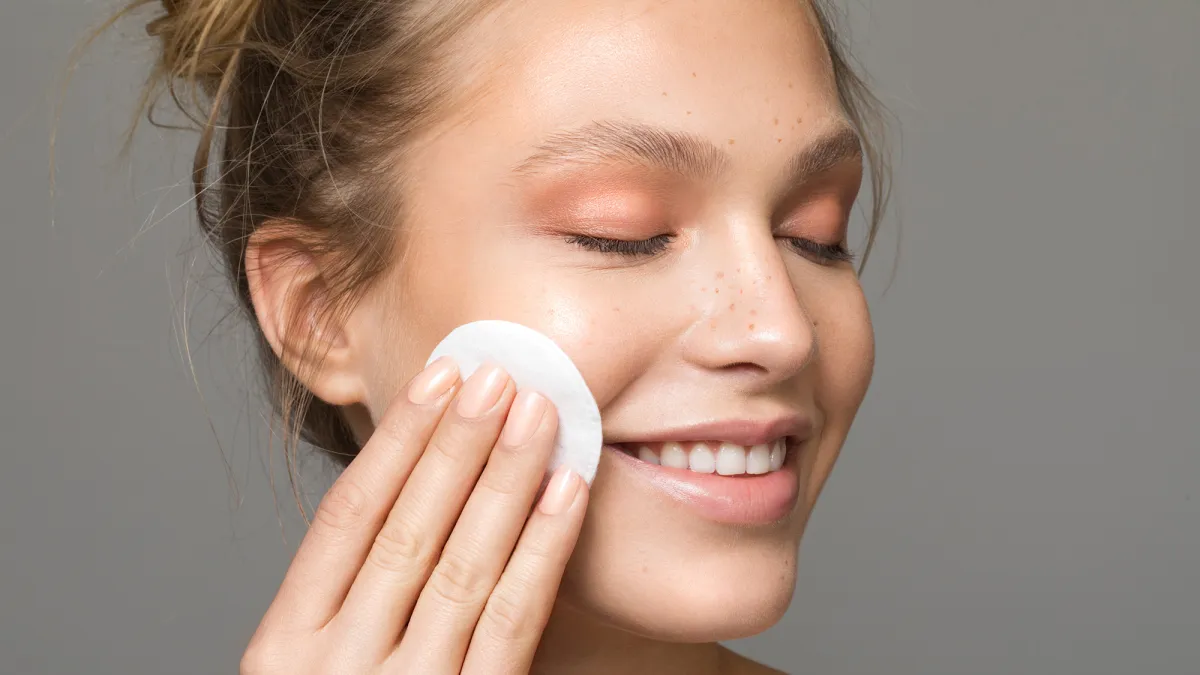 Woman Using Cotton Pad
