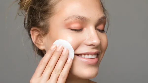 Woman Using Cotton Pad