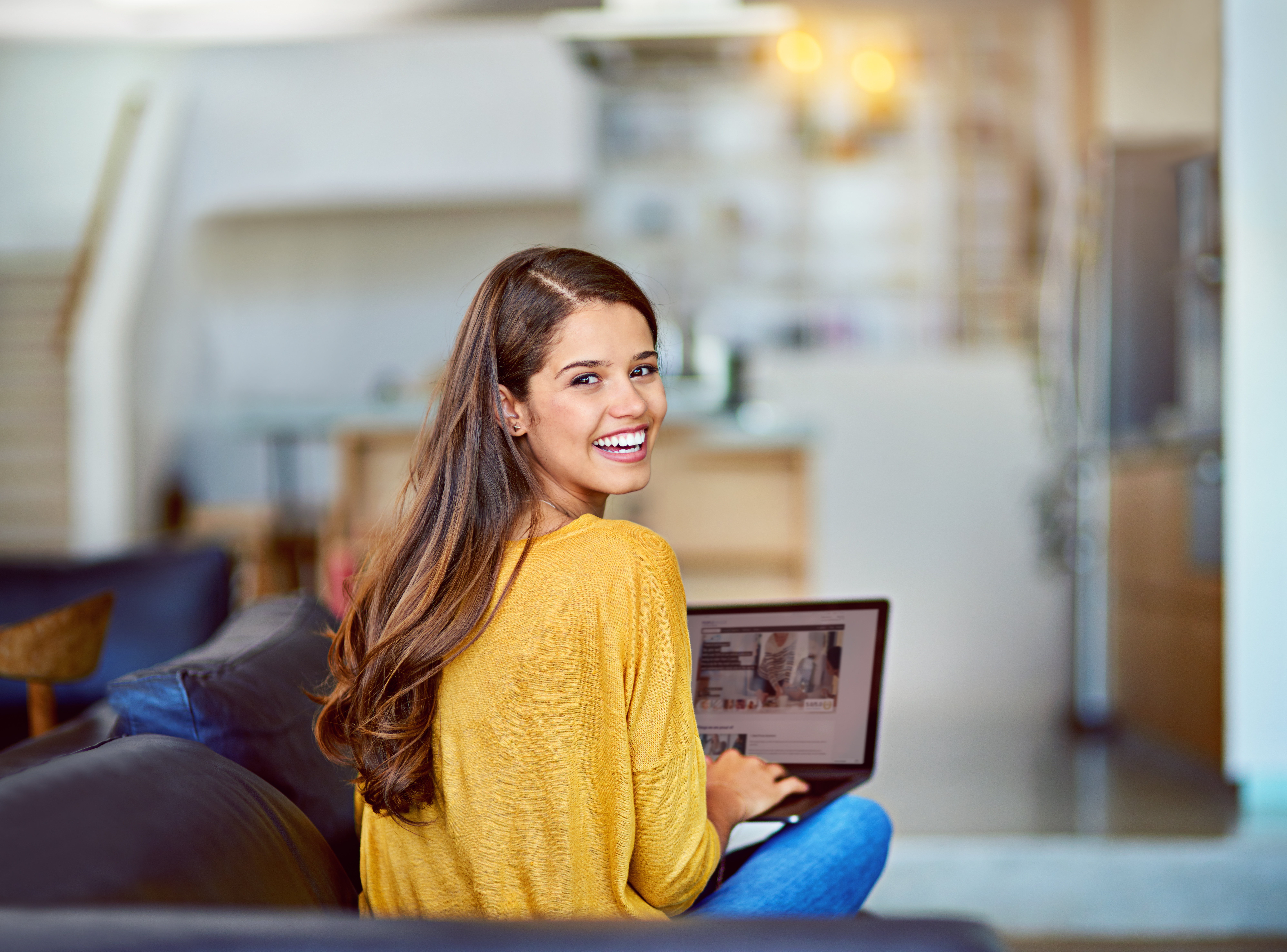 young woman using a laptop