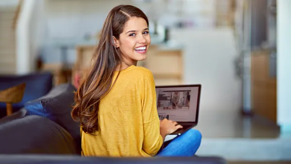 young woman using a laptop