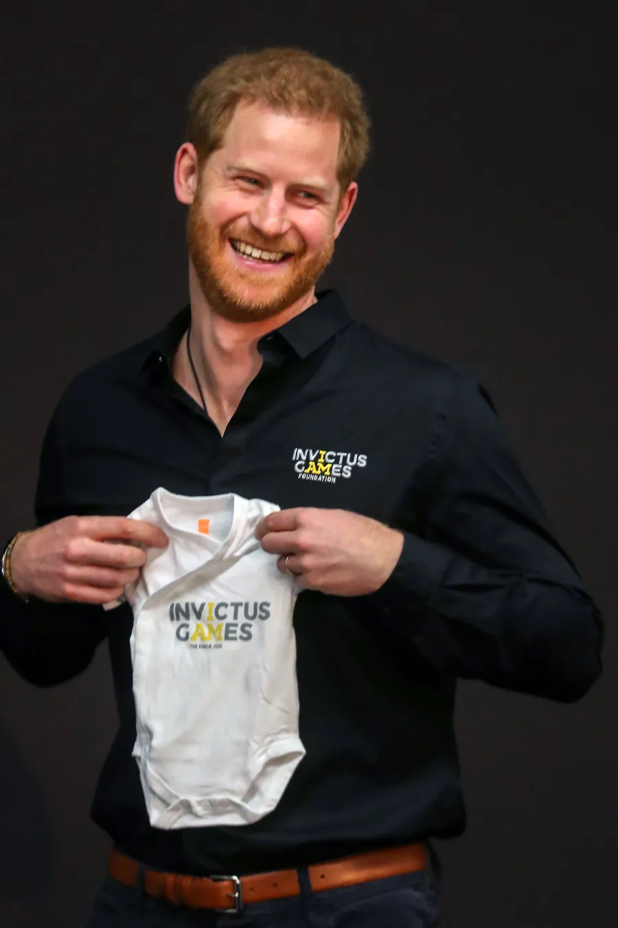 Prince Harry Gets a Gift for Baby Archie During Solo Day Trip to the Netherlands Onesie Invictus Games