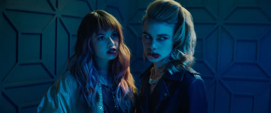 Night Teeth stars Debby Ryan as Blaire and Lucy Fry as Zoe.