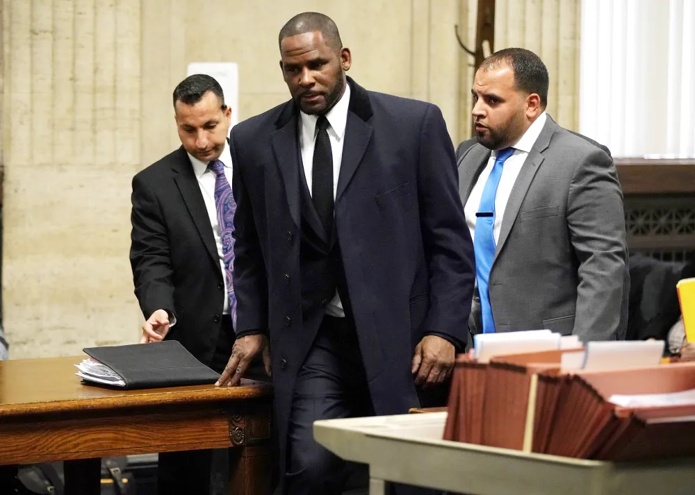 R. Kelly Charged With 11 Counts of Sexual Assault