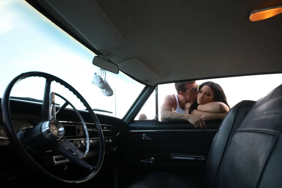 Cassie Expecting First Child With Boyfriend Alex Fine baby Shoes Hanging From Rear View Mirror