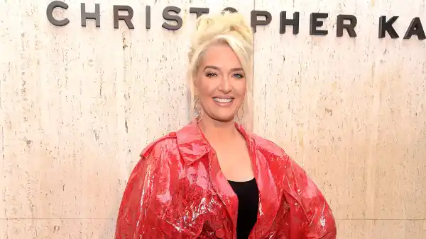 Erika Jayne Attends Christopher Kane's Party At Giorgio's Wearing A Long Red Jacket or Coat and Red Boots