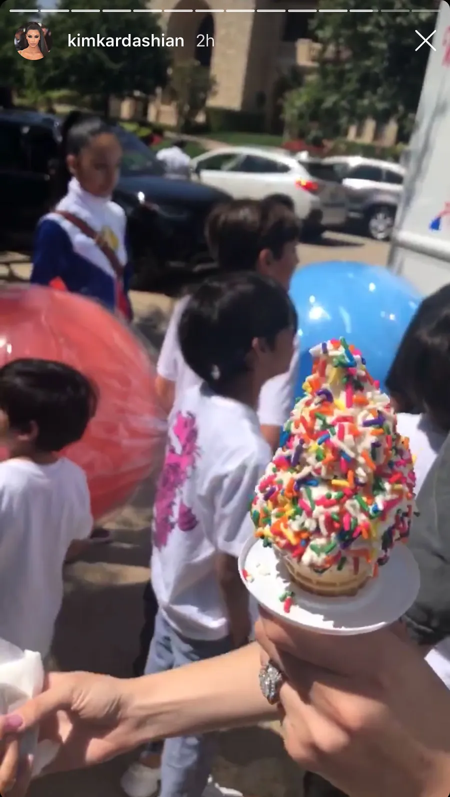 Kim Kardashian Shows Off Her Ice Cream Cone Woith Sprinkles and Vanilla