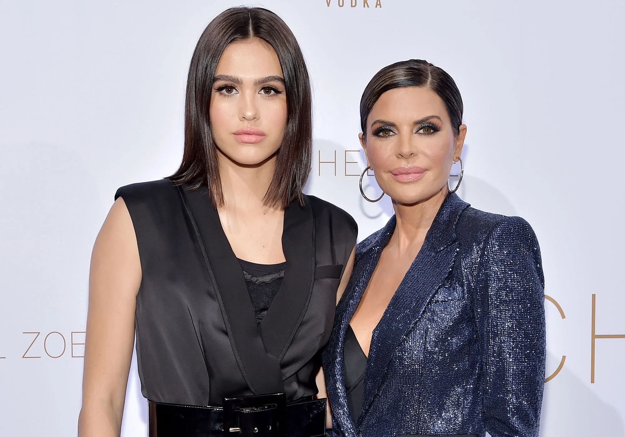 Lisa Rinna’s Daughter Amelia Says She Would Have Relapsed If She Hadn’t Revealed Eating Disorder Black Suit and Navy Blue Glitter Suit