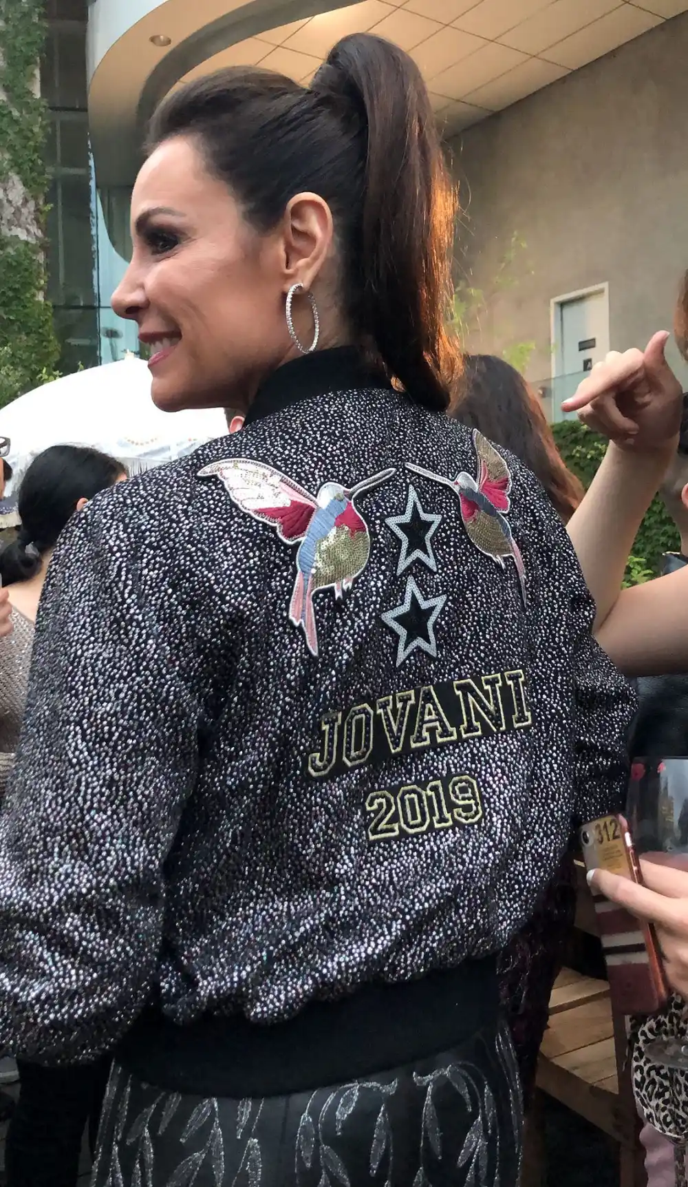 Luann de Lesseps Birds Jacket Jovani Ponytail Hoop Earrings